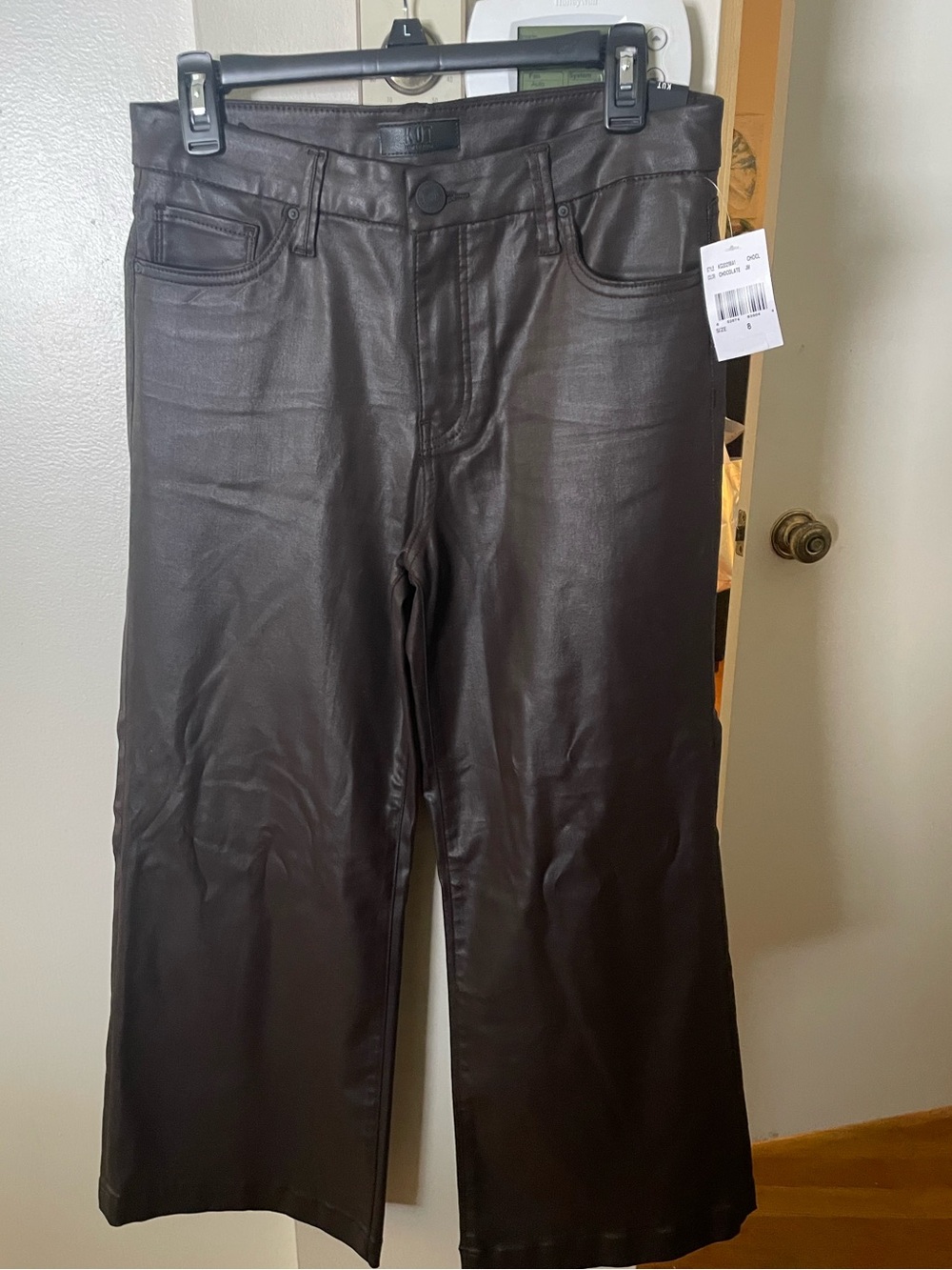 NWT KUT from the Kloth Meg High Rise wide leg coated jeans.